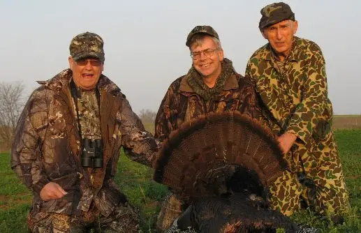 Tony, Randy and Randy's Dad with turkey.