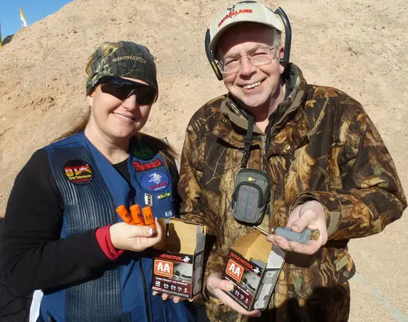Kim Rhode and the author holding AA TrAAcker shells.